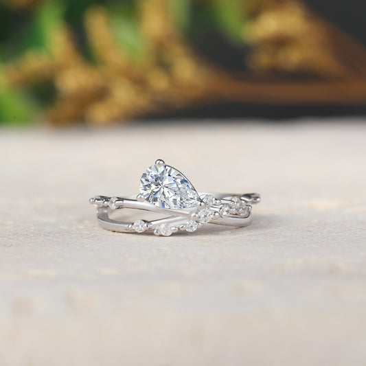 Tilted Pear Moissanite Ring with Twisted Pavé Band