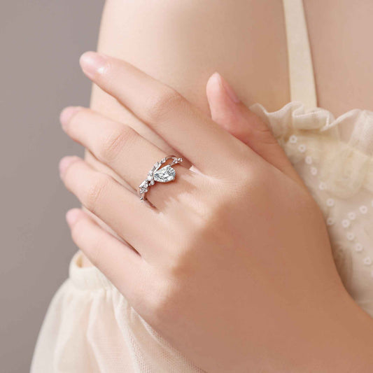 Tilted Pear Moissanite Ring with Twisted Pavé Band
